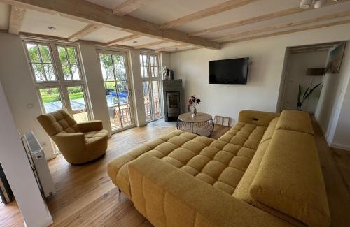 Ostermarsch House | Huus an`t Diek, Luxus in Deichnähe, Erdgeschosswohnung mit Pool, Nähe Norddeich