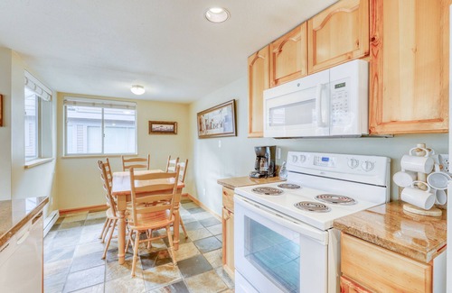 Village North House | Ideal first-floor getaway with hot tub, fireplace, & balcony - walk to lifts