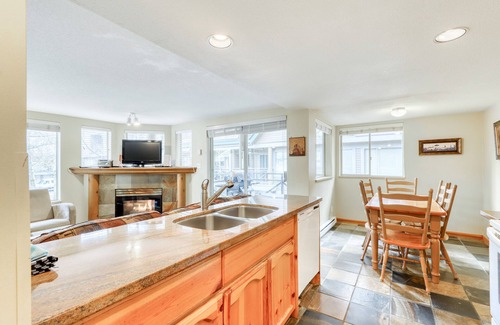Village North House | Ideal first-floor getaway with hot tub, fireplace, & balcony - walk to lifts