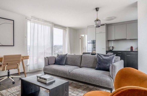 Center Apartment | Ideal Leimbach 2.5 Room w/ Storage & W/D, 5 min to Market, by Blueground