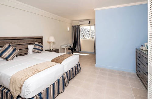 St. Lawrence Gap Hotel | Ideal Mix of Comfort and Value! 2 Modern Units! FREE Parking, Outdoor Pool!