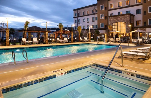 St. George Apartment | Ideal Retreat! King Suite Near Dixie State University | Complimentary Breakfast + Shared Pool & Hot Tub