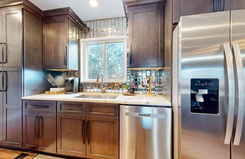 Fayetteville House | Ideally located home with enclosed yard, tiki bar, grill, smoker, & smart TVs