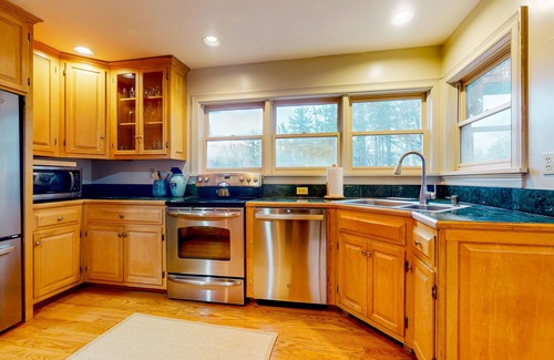 Arlington House | Ideally located spacious home with pool table, large deck, five fireplaces, W/D