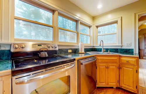 Arlington House | Ideally located spacious home with pool table, large deck, five fireplaces, W/D