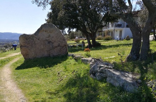 Telti Apartment | Idyllic apartment with unobstructed views to the Tyrrhenian sea