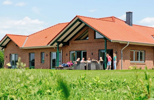 Soltau Villa | Idyllically situated villa in country house style with sauna Ideal for groups & families