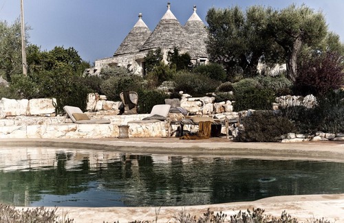 Ostuni House | Il Melograno, refined trullo with swimming pool in the Itria Valley surrounded by nature
