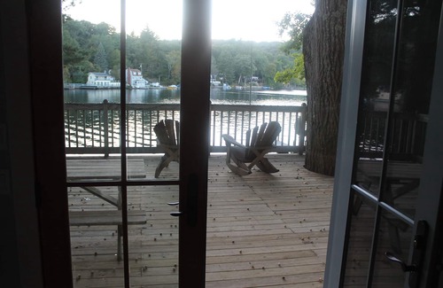 Winchester House | Immaculate Year-Round Lakefront-Charming cottage, swimming, boating, central air