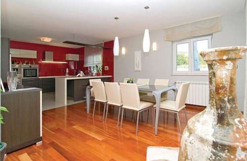 Seget House | In a small quiet place in a large garden is located this cottage with nicely furnished interiors.