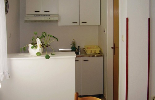Plomin Apartment | In the bay of Plomin, surrounded by greenery and near the industrial area, are these apartments.