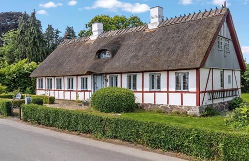 Bog By House | In the heart of Bogø Island, this beautiful thatched house welcomes you with authentic charm.