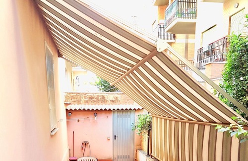 Nettuno Apartment | IN THE "HEART" OF NEPTUNE-BEACH, SHOPS, MEDIEVAL VILLAGE, MARINA AND STATION 5 MINUTES ON FOOT. GARDEN