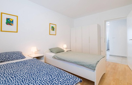 Vinjerac Apartment | In the tranquil coastal village of Vinjerac, this comfortable vacation apartment with a view of the