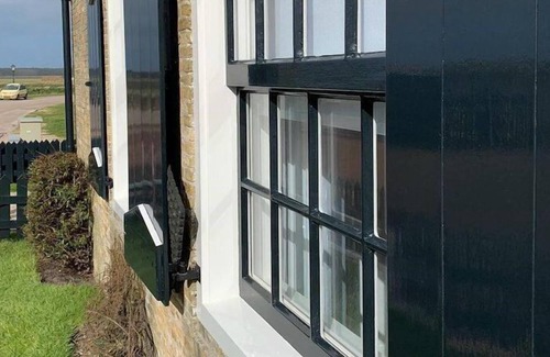 Den Hoorn House | In this beautiful house 't Wambuis you have an unobstructed view of the landscape and the dunes. the