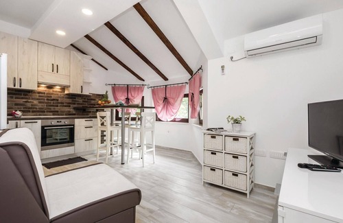 Viskovo Apartment | In Viskovo, a suburb of Rijeka, lies this lovingly and modernly furnished attic apartment.