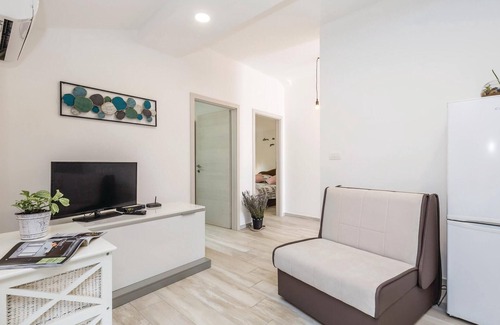 Viskovo Apartment | In Viskovo, a suburb of Rijeka, lies this lovingly and modernly furnished attic apartment.