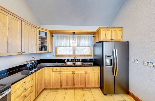 Wind Over Waves House | Incredible two-story home with private pool, hot tub, & game room