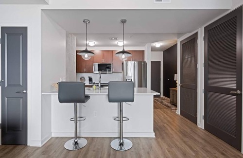 Midtown Apartment | Indulge in stylish living at our ideal location, perfect for relaxation and exploration of the city's offerings