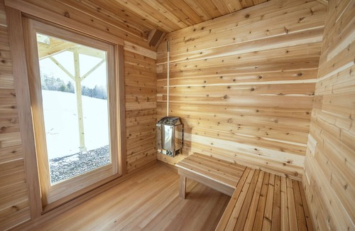 South Londonderry Cabin | Insanely romantic treehouse perched next to a stream and rolling hills.
