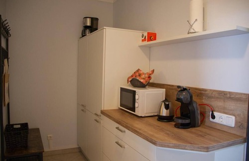 Fehmarn Apartment | Inselblume 65 - vacation home by the sea, view to the marina