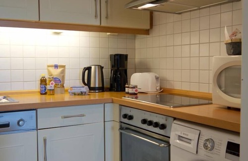 Fehmarn Apartment | Inselblume 74 - vacation home with balcony at the marina