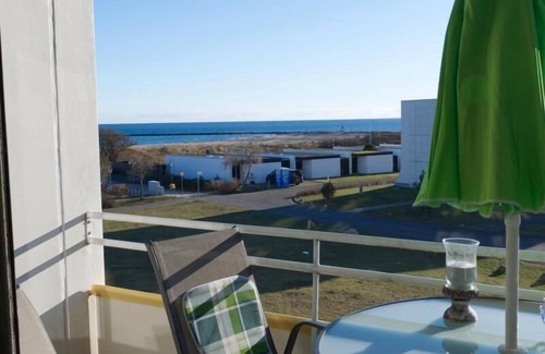 Fehmarn Apartment | Inselblume 74 - vacation home with balcony at the marina