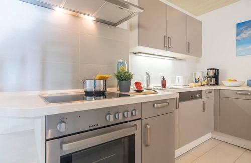 Fehmarn Apartment | Inselblume 76 - vacation home with sea view in Burgtiefe