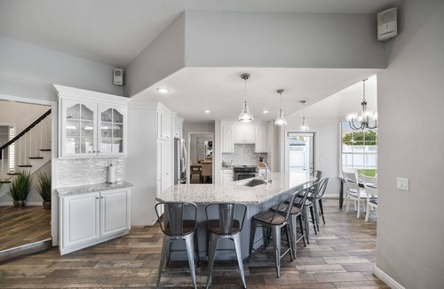 Visalia Villa | Inspired by the iconic white buildings and turquoise waters of Greece.