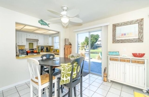 Oakland Hills House | Introducing Caddy Shack,the perfect abode for your short-term stay. This delightful 2 bed, 2 bath canal home has been thoughtfully remodeled to exude a beachy atmosphere