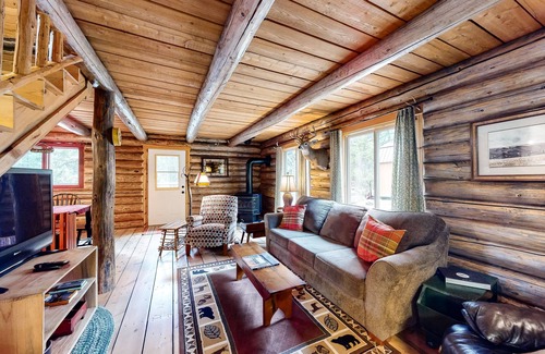 Enterprise Cabin | Inviting cabin with mountain view, fireplace, full kitchen, W/D, & back porch