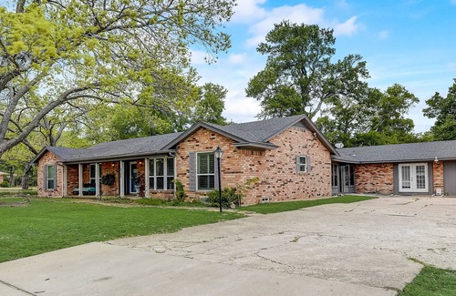 Sachse House | Inviting dog-friendly home with pool, full kitchen, central AC, & W/D