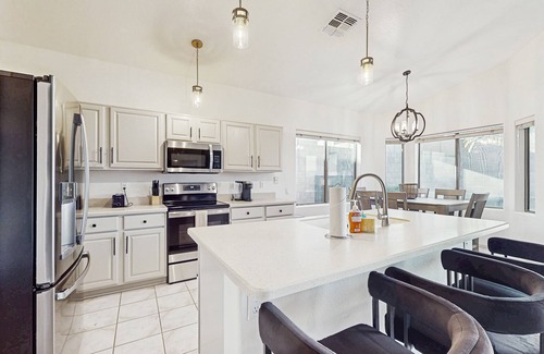 Foothills House | Inviting home with pool, hot tub, enclosed yard, fast WiFi, & W/D