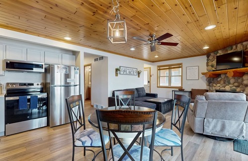 Lake Delton House | Inviting lakefront condo - amazing views, beach access, fireplace, dock, AC, W/D