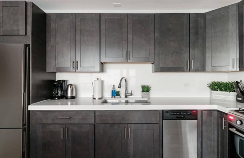 Uptown House | Inviting Stylish Home with Covered Patio