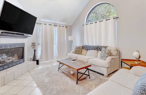 Dallas House | Inviting, two-story home on a large lot with a private pool, gas fireplace, & AC