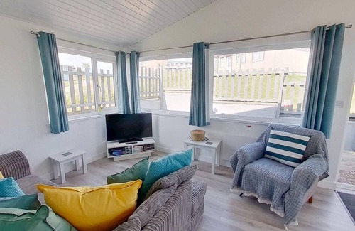 Hayle Apartment | Irene sits amongst the dunes, just a short walk to the three miles of golden, sandy beach below