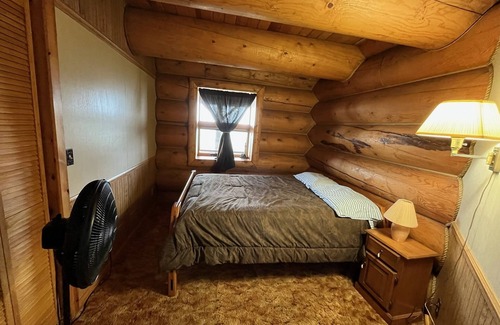 Bois Blanc Island Cabin | Island Getaway on BBI - Beautiful Log Home with Sandy Beachfront on Lake Huron