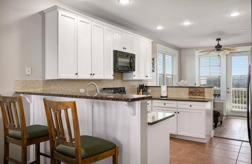 Red Fish Cove Condo | Island Getaway - Dog Friendly with Stunning Views of the Bay