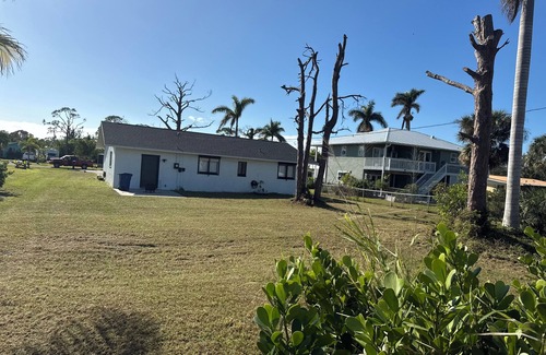 Saint James City House | Island Getaway, with boat ramp access nearby. You can park your boat on property