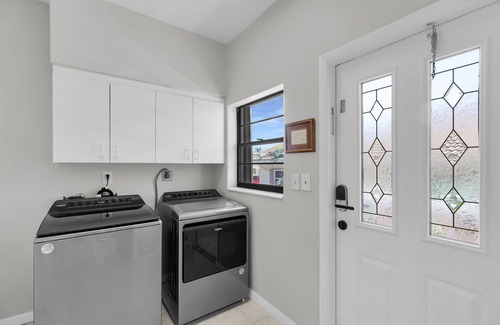 Coury House | Island Paradise-large 2 bedroom/2 bath SFH with Cabana club and 75ft of dockage