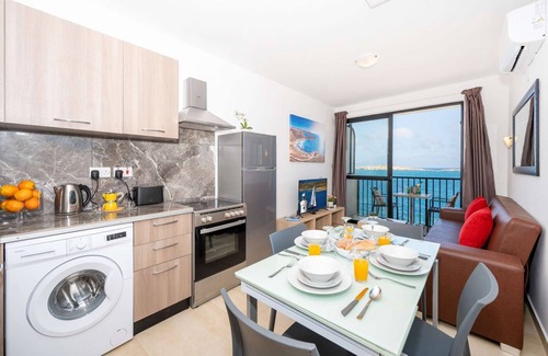 Qawra Apartment | Islet Promenade Seafront 1 Bedroom Apartment with 2 seaview balconies