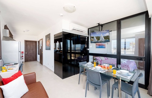 Bugibba Apartment | Islet Seafront Penthouse with breath seaviews hot tub on large terrace