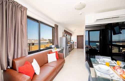 Bugibba Apartment | Islet Seafront Penthouse with breath seaviews hot tub on large terrace