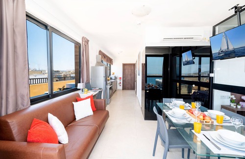Bugibba Apartment | Islet Seafront Penthouse with breath seaviews hot tub on large terrace