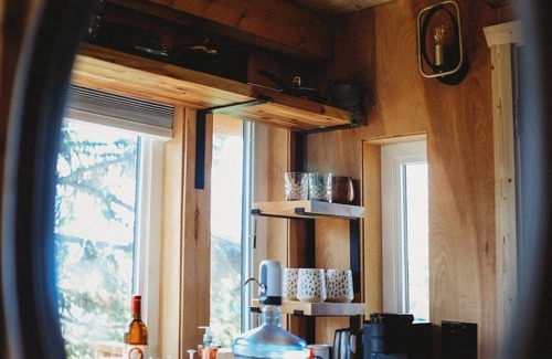 College House | It is a tiny home in the treehouse located in the middle of Fairbanks.