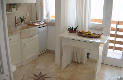 Marina di Castagneto Carducci Apartment | Nice apartment for 4 people with A/C, WIFI, patio, panoramic view and parking