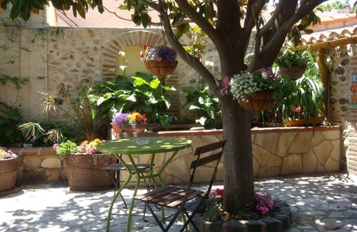 Espira de l'Agly Apartment | Ivy covered stone Mas part of an 18th century former convent.