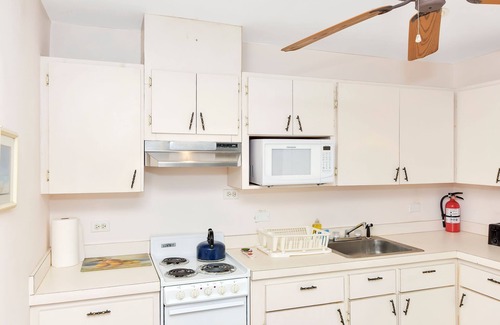 George Town Cottage | Ixora West - Views over Elizabeth harbor, beach access across the road.