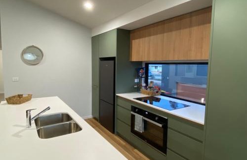 East Jindabyne House | Jindabyne House 2, Modern 3 bedroom home, lake & mountain views with fireplace